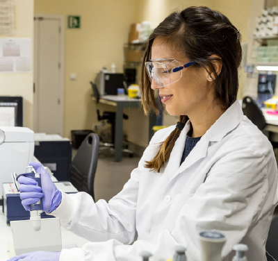 healthcare professional in lab coat working