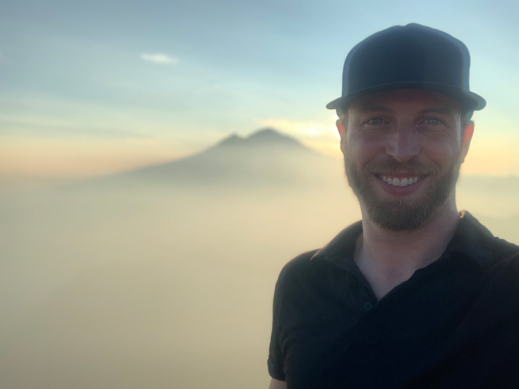 Sam Wright climbing a mountain