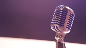 silver microphone with dark backgruond